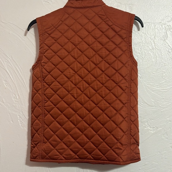 Boys puffer vest fleece lined. Zip and snaps. Size 10/12 burnt orange color. - Picture 3 of 5